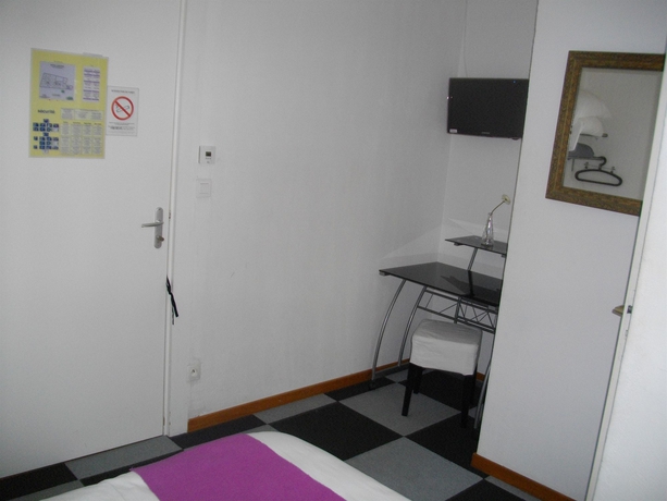 Imagen de la habitación del Hotel Central, Carcassonne. Foto 11