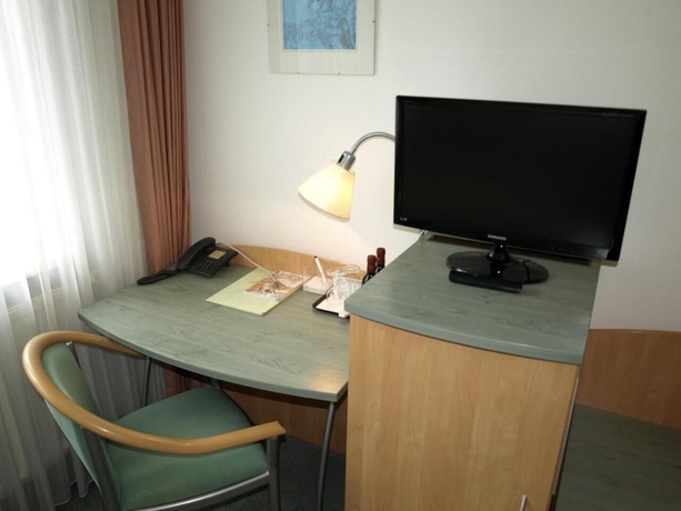Imagen de la habitación del Hotel Central Classic. Foto 16