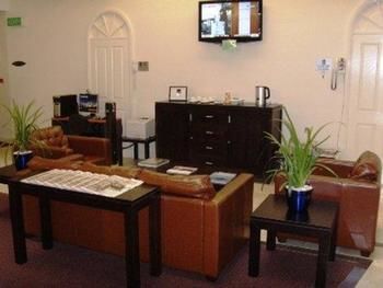 Imagen de la habitación del Hotel Central Cosmo Apartments. Foto 8