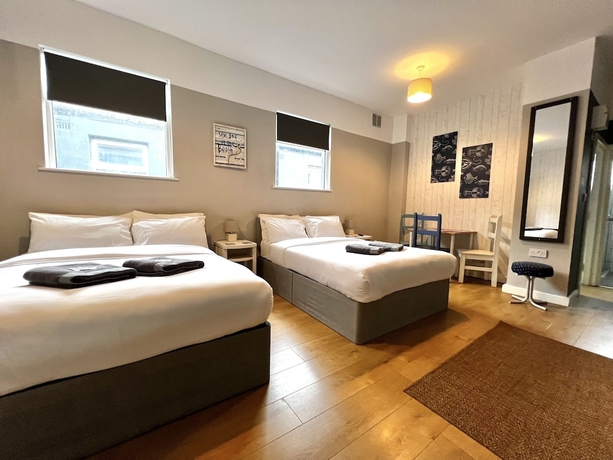 Imagen de la habitación del Hotel Central Cove Guesthouse. Foto 4