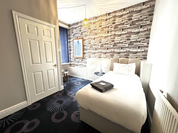 Imagen de la habitación del Hotel Central Cove Guesthouse. Foto 6