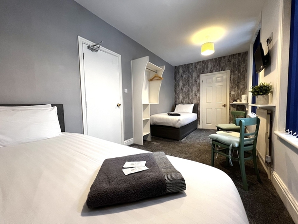 Imagen de la habitación del Hotel Central Cove Guesthouse. Foto 9