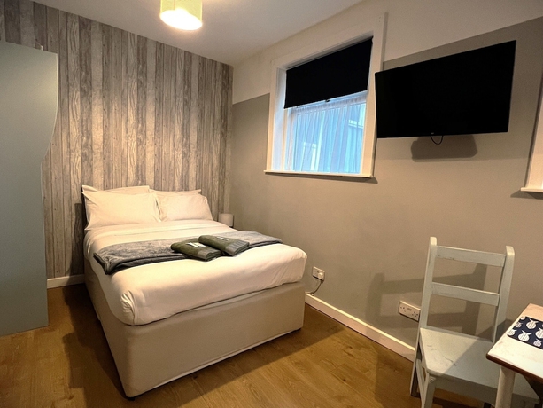 Imagen de la habitación del Hotel Central Cove Guesthouse. Foto 11
