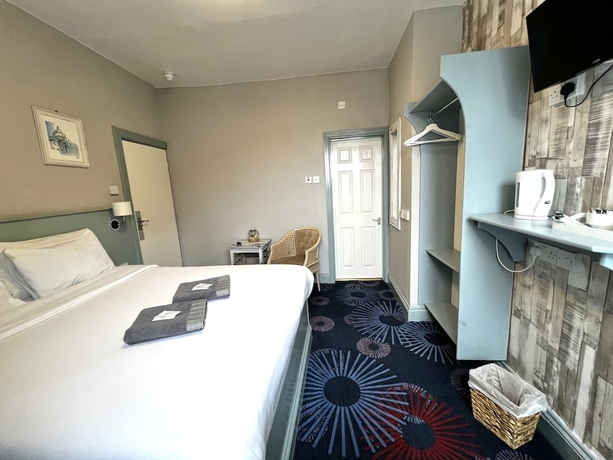Imagen de la habitación del Hotel Central Cove Guesthouse. Foto 12