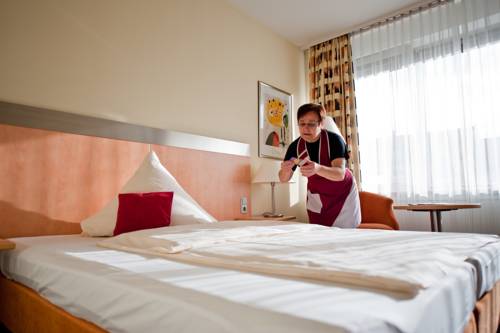 Imagen de la habitación del Hotel Central, Frankenthal. Foto 8