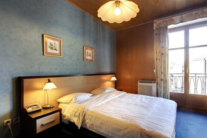 Imagen de la habitación del Hotel Central, Ginebra. Foto 6