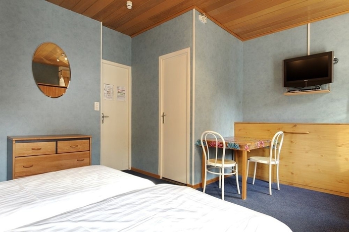 Imagen de la habitación del Hotel Central, Ginebra. Foto 11