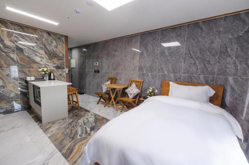 Imagen de la habitación del Hotel Central Gwangju & Residence. Foto 19