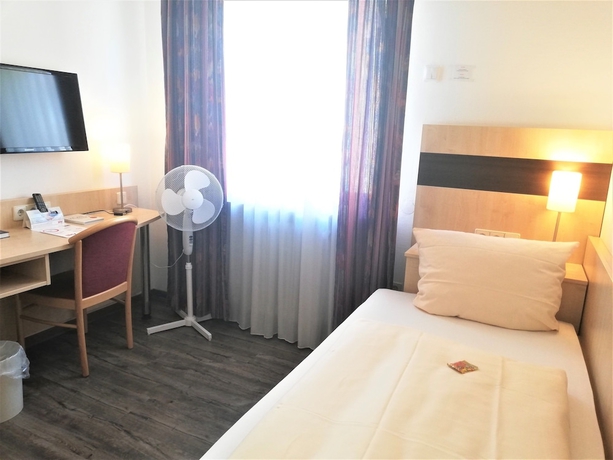 Imagen de la habitación del Hotel Central Heidelberg. Foto 5