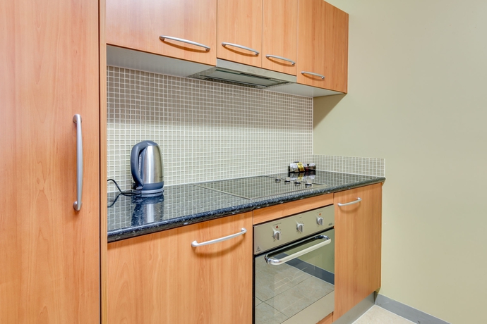 Imagen de la habitación del Hotel Central Hillcrest Apartment. Foto 10