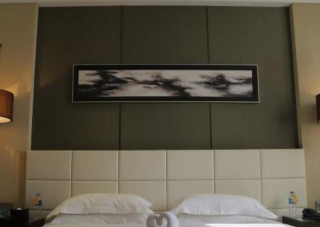 Imagen de la habitación del Hotel Central Hotel, Qinhuangdao. Foto 4