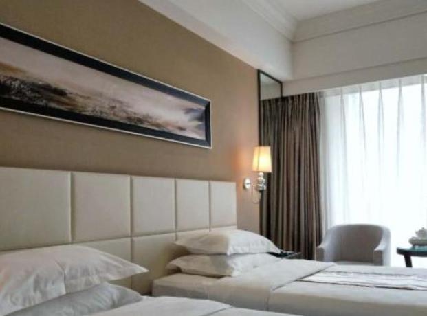 Imagen de la habitación del Hotel Central Hotel, Qinhuangdao. Foto 8