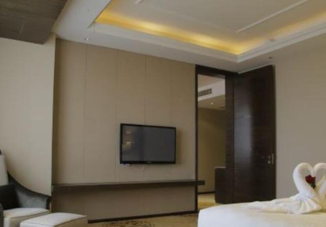 Imagen de la habitación del Hotel Central Hotel, Qinhuangdao. Foto 11