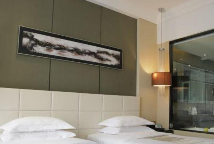 Imagen de la habitación del Hotel Central Hotel, Qinhuangdao. Foto 14