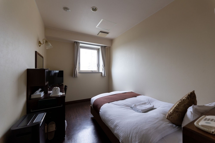 Imagen de la habitación del Hotel Central Isohara. Foto 7