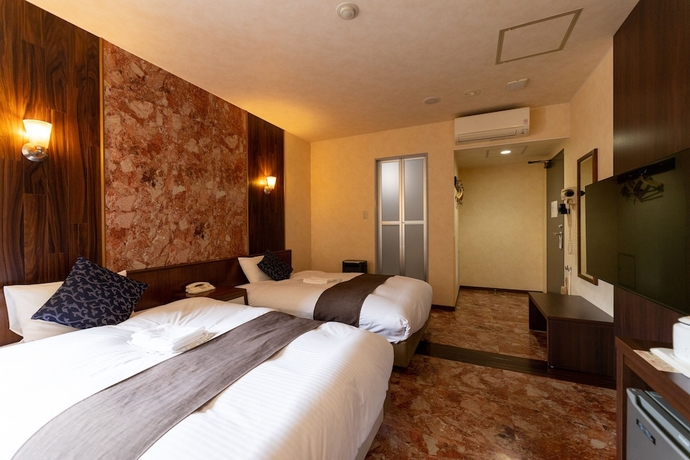 Imagen de la habitación del Hotel Central Isohara. Foto 14