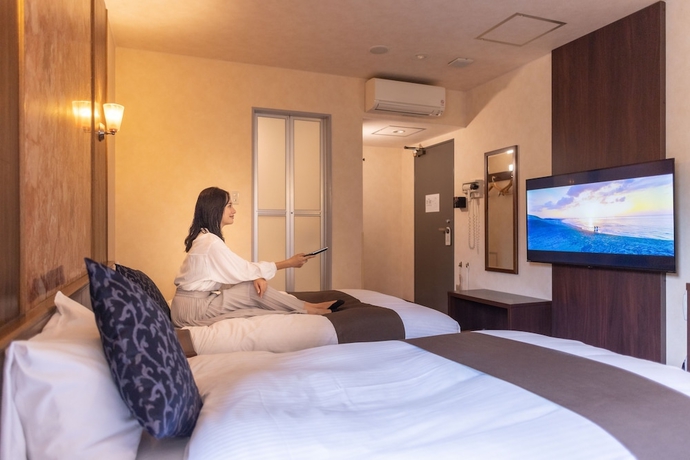 Imagen de la habitación del Hotel Central Isohara. Foto 15