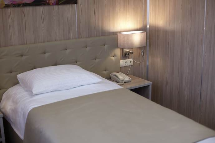 Imagen de la habitación del Hotel Central, Kurgan. Foto 5