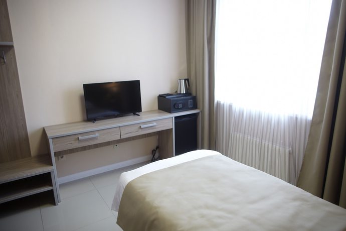 Imagen de la habitación del Hotel Central, Kurgan. Foto 9