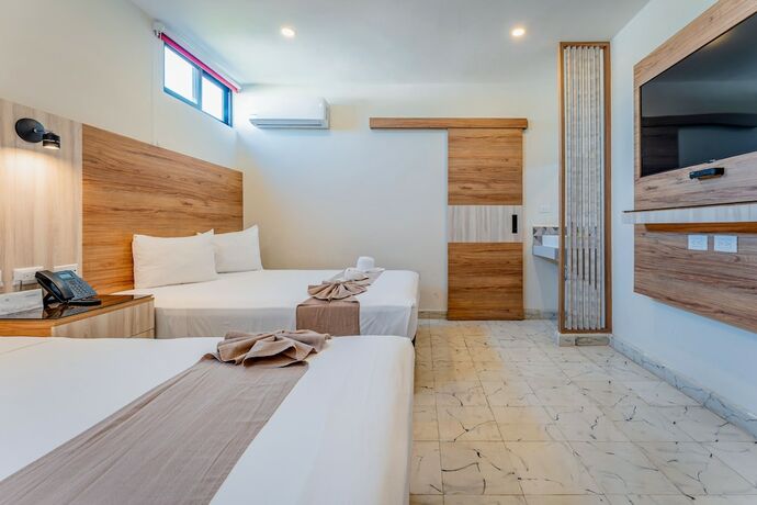 Imagen de la habitación del Hotel Central Merida by Kavia. Foto 19