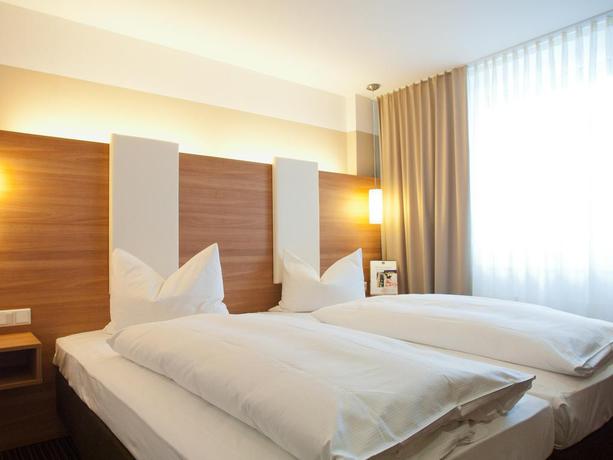 Imagen de la habitación del Hotel Central, Neu Isenburg. Foto 3