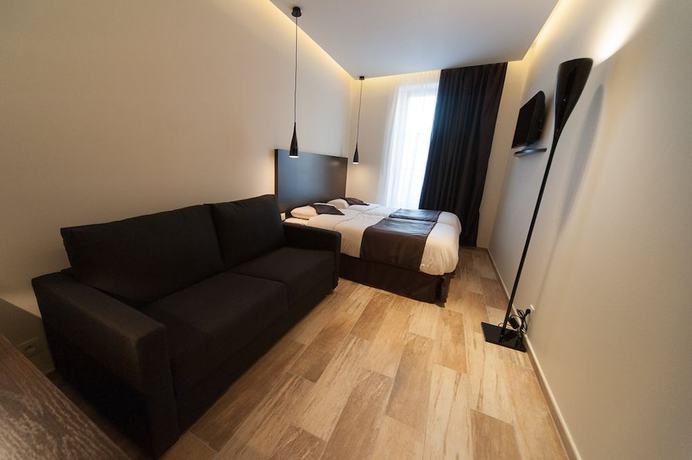 Imagen de la habitación del Hotel Central, Nimes. Foto 12