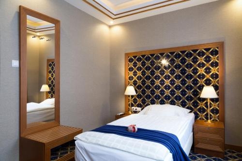 Imagen de la habitación del Hotel Central, Nyiregyhaza. Foto 9