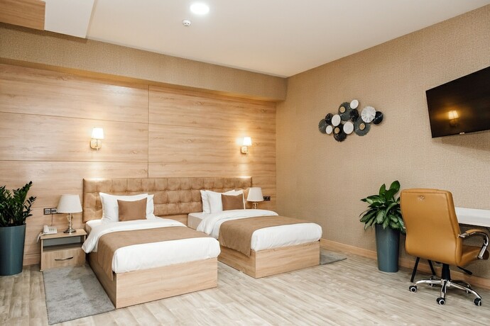Imagen de la habitación del Hotel Central Palace Halal. Foto 14