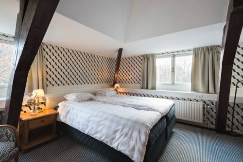 Imagen de la habitación del Hotel Central Park Voorburg. Foto 9