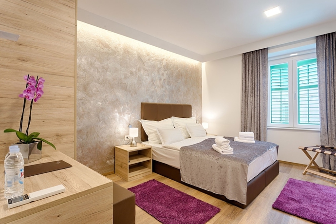 Imagen de la habitación del Hotel Central Pearl by Nono Ban. Foto 13