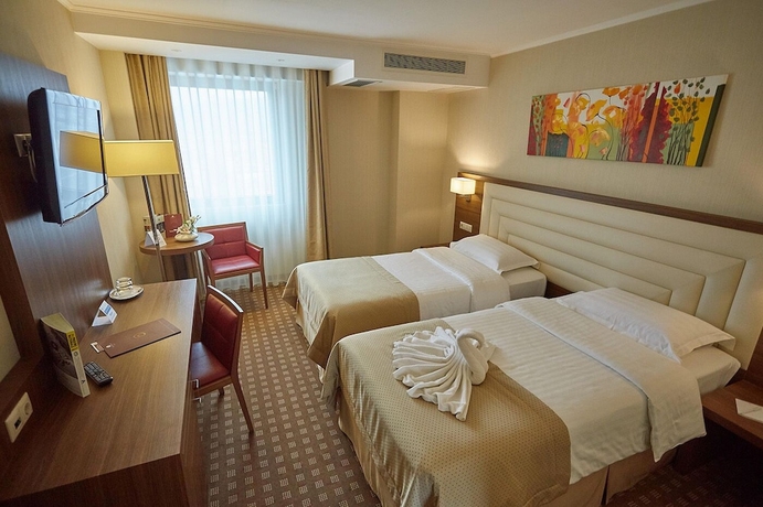 Imagen de la habitación del Hotel Central Plaza, Piatra Neamt. Foto 2