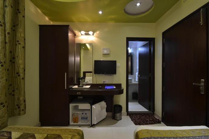 Imagen de la habitación del Hotel Central Residency. Foto 11