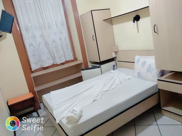 Imagen de la habitación del Hotel Central Ros&aacute;rio. Foto 14