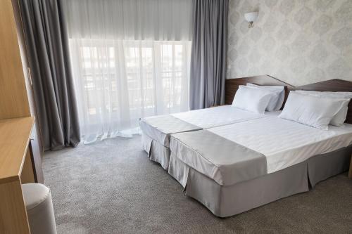 Imagen de la habitación del Hotel Central, Ruse. Foto 19