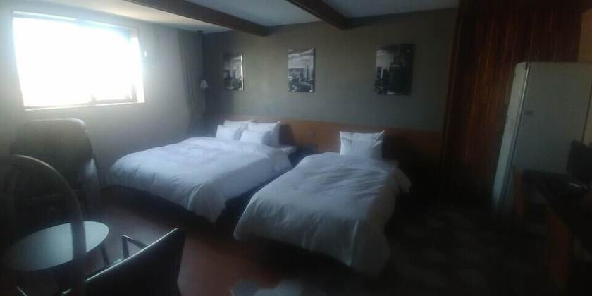 Imagen de la habitación del Hotel Central, Sacheon. Foto 6