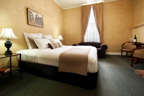 Imagen de la habitación del Hotel Central Springs Inn. Foto 5