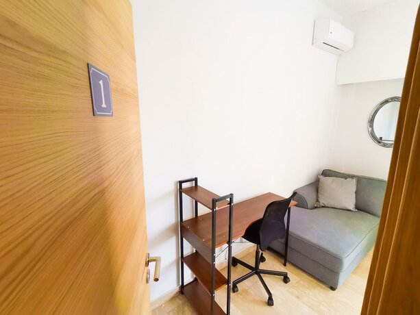 Imagen de la habitación del Hotel Central Square Nomadic Rooms. Foto 11