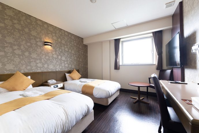 Imagen de la habitación del Hotel Central Takahagi. Foto 3