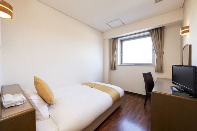 Imagen de la habitación del Hotel Central Takahagi. Foto 5