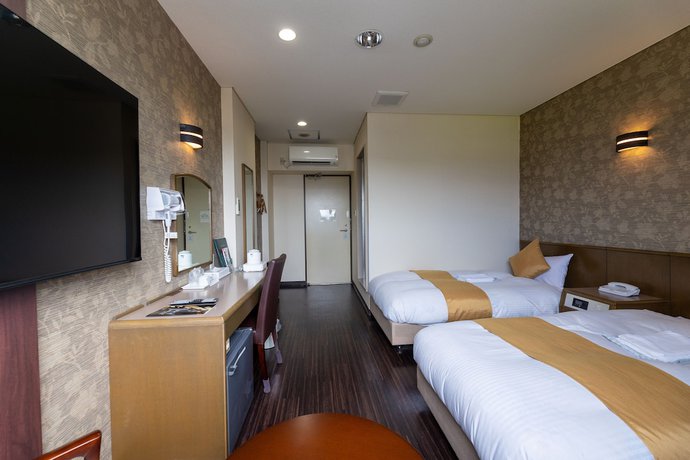 Imagen de la habitación del Hotel Central Takahagi. Foto 6