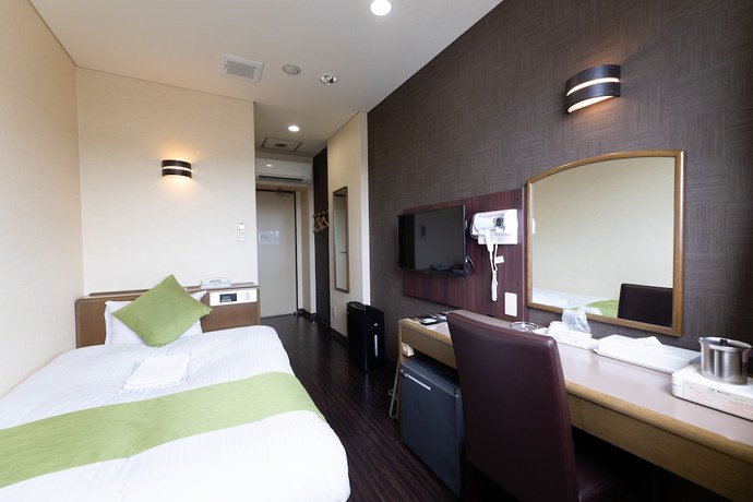Imagen de la habitación del Hotel Central Takahagi. Foto 7