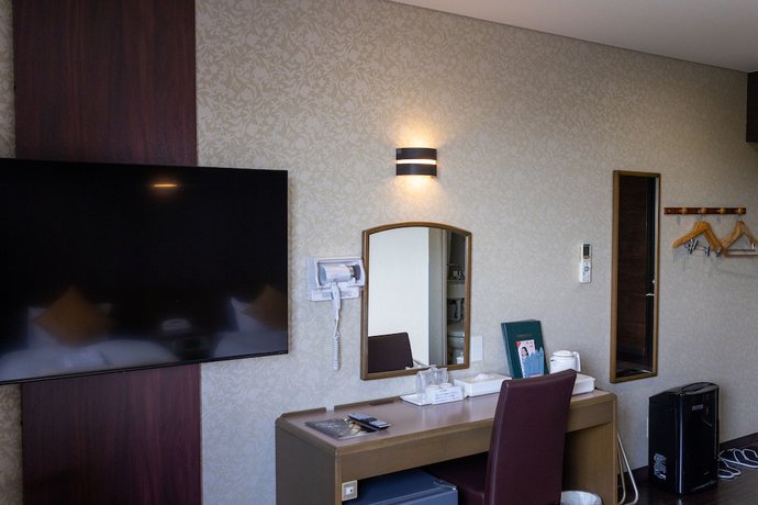 Imagen de la habitación del Hotel Central Takahagi. Foto 10