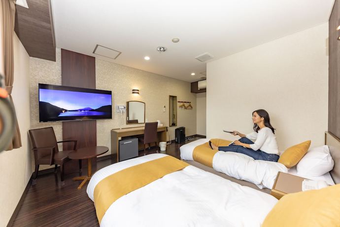 Imagen de la habitación del Hotel Central Takahagi. Foto 11