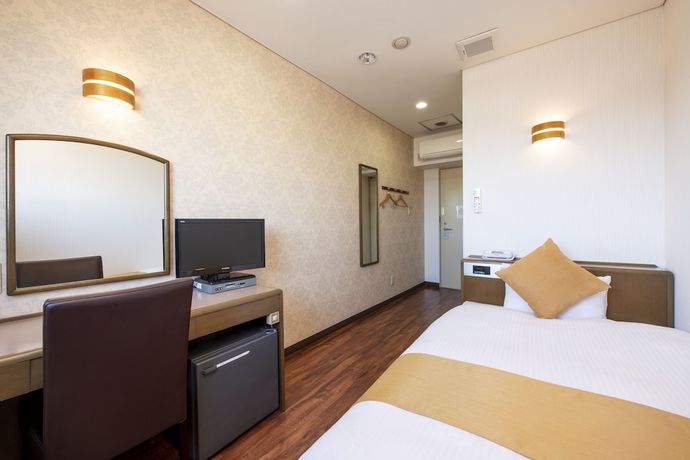 Imagen de la habitación del Hotel Central Takahagi. Foto 12