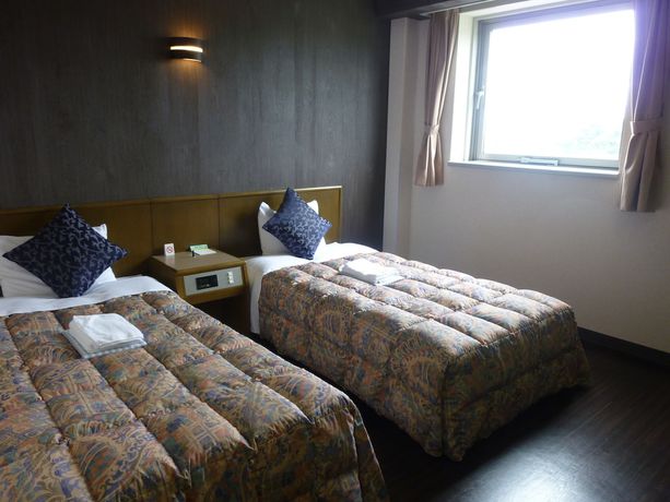 Imagen de la habitación del Hotel Central Takahagi. Foto 13