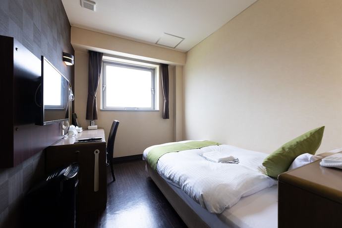 Imagen de la habitación del Hotel Central Takahagi. Foto 14