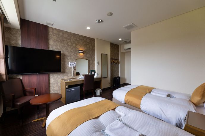 Imagen de la habitación del Hotel Central Takahagi. Foto 15