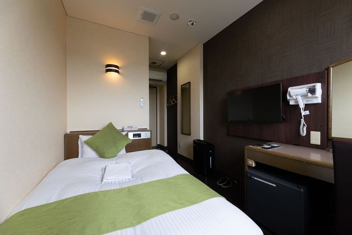 Imagen de la habitación del Hotel Central Takahagi. Foto 16
