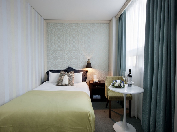 Imagen de la habitación del Hotel Central Tourist. Foto 4