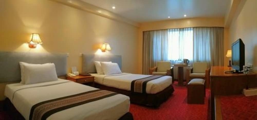 Imagen de la habitación del Hotel Central Yangon. Foto 16